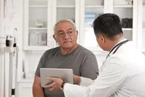 Diagnose einer chronischen Prostatitis durch einen Urologen. 